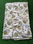 TOVAGLIA CON VOLANT IN COTONE PLASTIFICATO PRIMAVERA