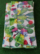 TOVAGLIA CON VOLANT IN COTONE PLASTIFICATO CACTUS