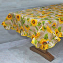TOVAGLIA CON VOLANT IN COTONE PLASTIFICATO GIRASOLE
